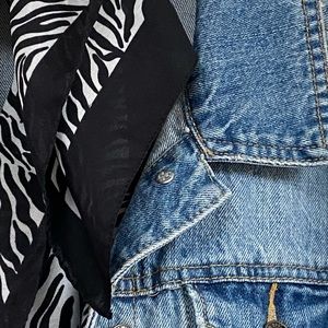 Black and white silky scarf.